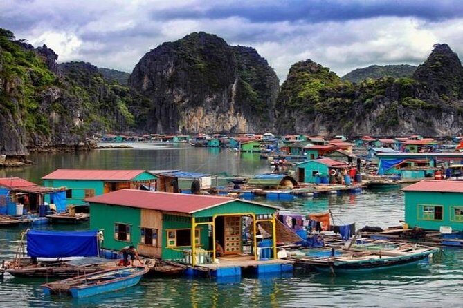 1 Day Boat Tour: HaLong Bay, Lan Ha Bay, Natural Beach and Full Moon Party - Stop 2 in Lan Ha Bay: kayaking through Bright Cave and Dark Cave