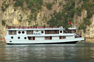 2-Day Oriental Sails Junk Cruise of Halong Bay - Day 1 on Oriental Sails: lunch cruising, caves, then sunset drinks