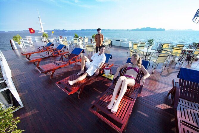 2D1N Ha Long Bay by Calypso Cruise, Caves, Meals, Transfer - Day 2 early morning: tai chi, breakfast, then kayaking near floating villages