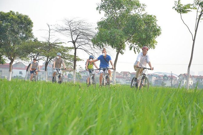 Bicycle Tours Hanoi: Full Day Bicycle Tours City & Countryside - Huu Tiep Lake and the Downed B-52: A Serious Stop Without the Spectacle