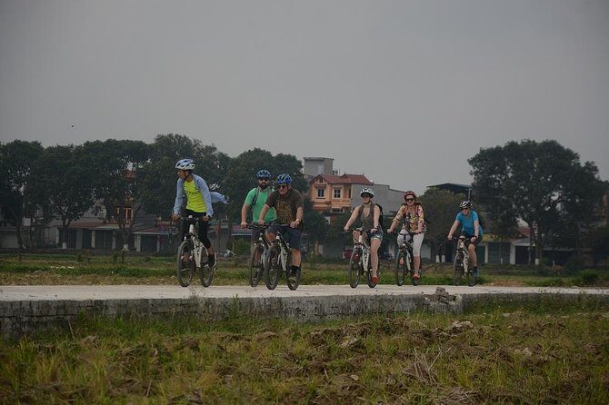 Bicycle Tours Hanoi: Full Day Bicycle Tours City & Countryside - Co Loa Citadel Area: Market Tastings, Fruit Breaks, and Sugarcane Cool-Down