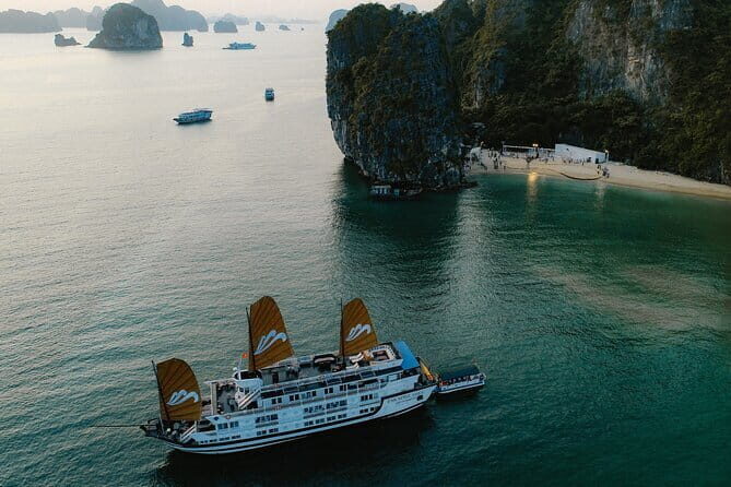 Emeraude Cruise 2 days 1 night Ha Long Bay Tour - Day 2 at dawn: tea, coffee, cakes, and yoga option