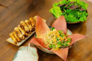 Experience Hanoi Cooking Class with Free Wine Tasting - Back in the kitchen: knife skills and cooking four iconic Vietnamese dishes