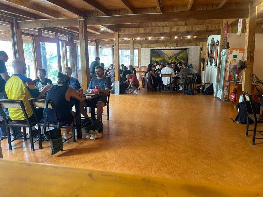From Sapa: Guided Full-Day Trekking with Lunch and Drop-Off - Ta Van Village at midday: stilt houses and a change of pace