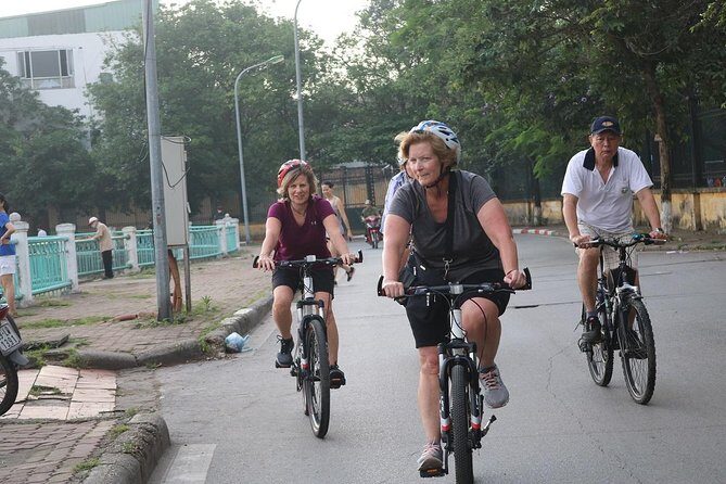 Half-Day Bicycle Tour Combine City & Countryside + Train Street - West Lake and Thanh Nien Road: the view stop that resets your whole ride