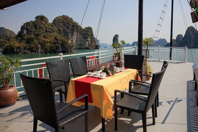 Halong 6 hours Boat tour with Cave, Kayak, lunch, transfer high-way from Hanoi - Hang Luon Cave lagoon: kayak freedom or bamboo-boat calm
