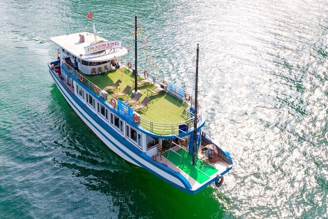 Halong Bay Day Tour With Titop Island, Cave, Kayak & Lunch - Sung Sot Cave: Stalagmites, Stairs, and the Must-See Interior
