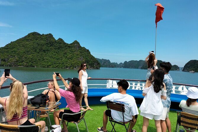 Halong Bay Day Tour With Titop Island, Cave, Kayak & Lunch - Luon Cave Area Kayaking or Bamboo Boat: A Hands-On Halong Bay Moment