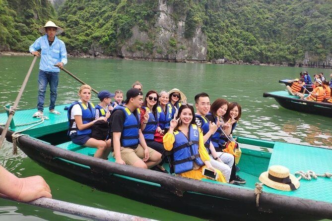Halong Bay Day Tour With Titop Island, Cave, Kayak & Lunch - Titop Island: The 400-Step View Climb vs. Beach Time