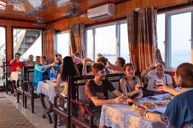 Halong Bay Day Tour With Titop Island, Cave, Kayak & Lunch - Sunset Party and Back to Hanoi: Timing Your Photos Without Losing Your Mind