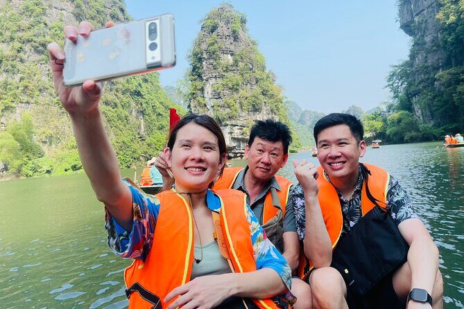 Hang Mua - Hoa Lu - Tam Coc Small Group Tour 8 People a Group - Cycling through Ninh Binh rice fields: a different kind of view