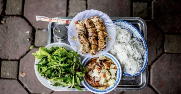 Hanoi: 7 Tastings Street Food Tour with Train Street - Train Street: The Hanoi Alley You’ll Remember