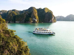 Hanoi: Ha Long Bay Day Cruise - Swimming, Meal, Kayaking - From Hanoi to Tuan Chau: pickup, the 2.5-hour ride, and a quick pearl stop
