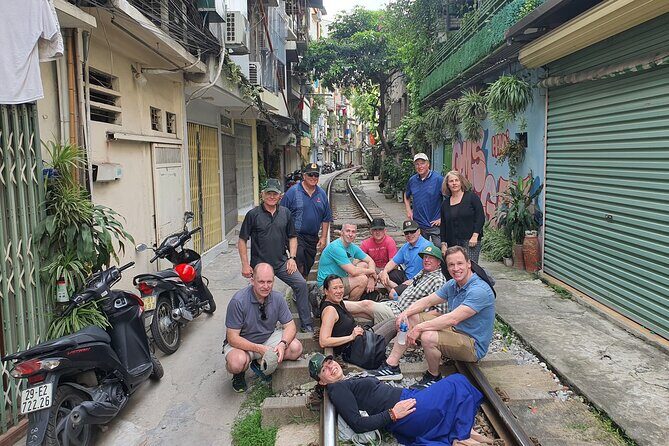 Hanoi Jeep Tour: Food, Culture and Fun by Vietnam Army Jeep - Stop 3: Hanoi Train Street coffee moment (timing matters)