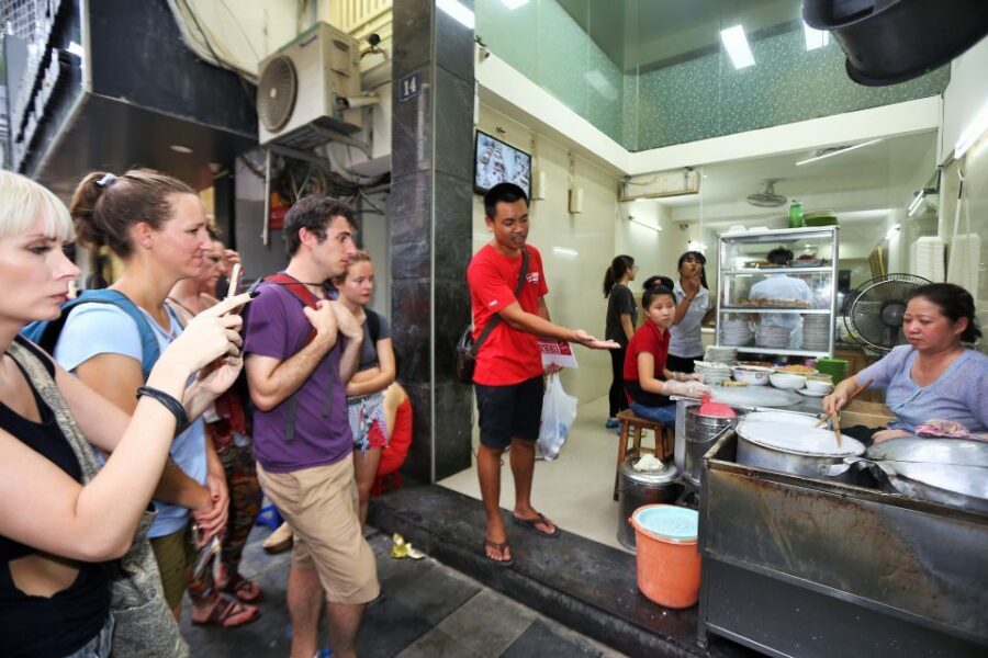 Hanoi: Street Food Experience with 5 Food Stops - Bun cha stop: grilled chả over bún with herbs