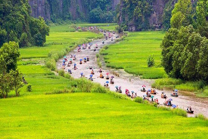 Hoa Lu Tam Coc Full-Day DELUXE Tour Including BUFFET LUNCH & River Boat Ride - Inside the caves and the cave-side “shopping moment”