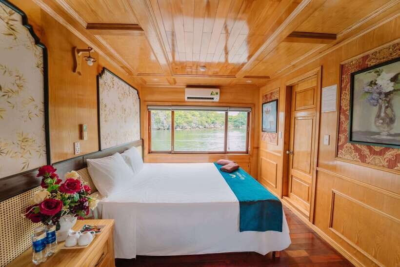 Lan Ha Bay: 2-Day Cruise with Meals, Activities and Pickup - Sunset return and the onboard rhythm: cooking, happy hour, squid fishing, karaoke