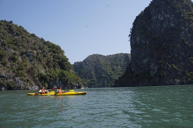 Most favorite full day boat tour with kayaking in Lan Ha bay, Ha Long bay - Three Peach Beaches (12:00–13:00): Sand, Swim, and the Boat Jump