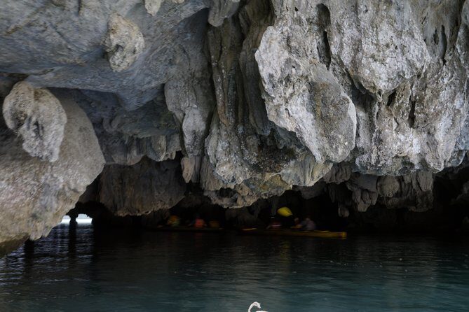 Most favorite full day boat tour with kayaking in Lan Ha bay, Ha Long bay - Dark-Bright Caves Kayak Time: The Main Event