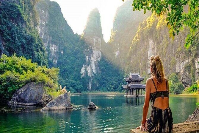 Ninh Binh Day Tour to Hoa Lu Trang An Mua Cave with Buffet Lunch - Mua Cave: cycling through villages, then the climb for views