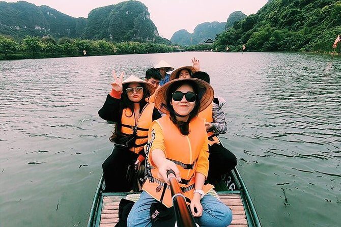 Ninh Binh Full Day Tour to Hoa Lu Tam Coc Mua Cave Buffet Lunch - Tam Coc Boat Ride on the Ngo Dong River Plus Cycling Time