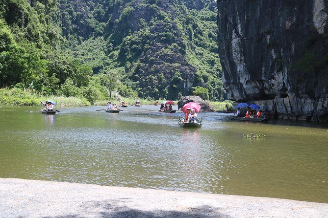 Ninh Binh Luxury Tour 2 Days 1 night by limousine See Hidden Gems - The Tam Coc bamboo boat ride: caves, water, and time for photos