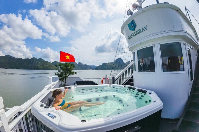 Oasis Bay Party Cruise 3 Days 2 Nights - Ha Long Bay Tour - What you can do onboard: kayaking, trampoline, and the outdoor jacuzzi