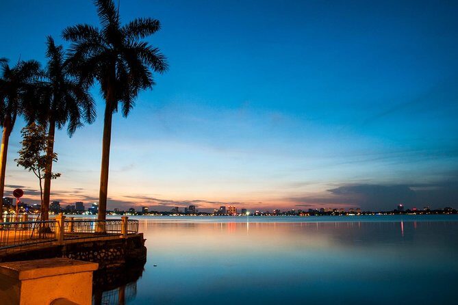 Private Hanoi Motorbike Sightseeing and Food Tour - Hanoi Flag Tower and West Lake: views, breaks, and the city’s wide space