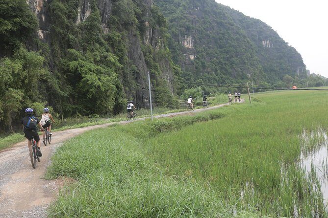 Red River island backroad, Rural Countyside Area and Train Street - The Hanoi pickup and bike setup (where the tour starts feeling easy)