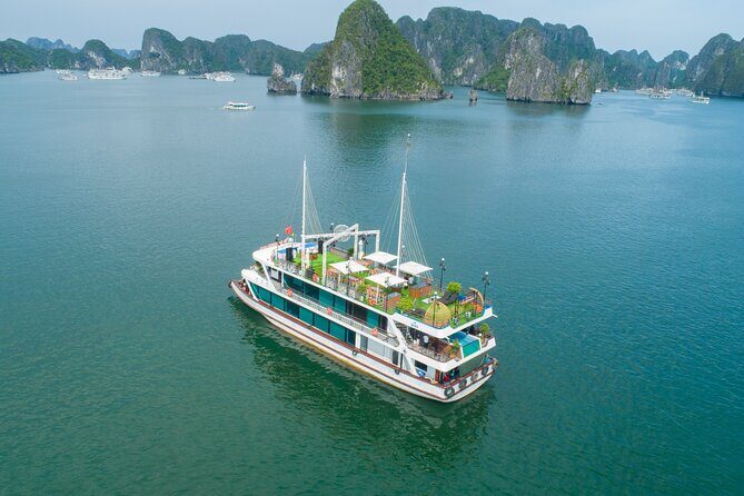 Sweetness Cruise Ha Long Bay: Caves, Kayaking, Swimming & Lunch - Sung Sot Cave: The First Big Wow on Foot