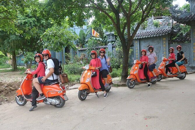 The insider's Hanoi + Train Street 4,5 Hours Female Ao Dai Riders - Ba Dinh Square and landmarks you can’t miss