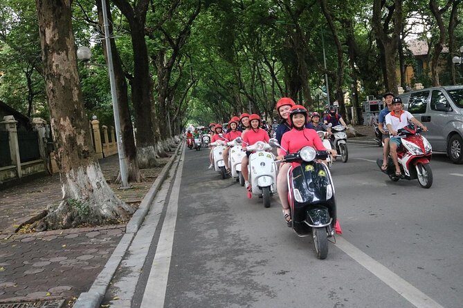Vespa City Tour &Train Street Female With Ao Dai Riders 4,5 Hours - Why a Hanoi female-led Vespa tour feels more workable