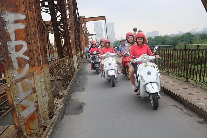 Vespa City Tour &Train Street Female With Ao Dai Riders 4,5 Hours - Ba Đình Square passes and the Ho Truc Bach finish with lunch and cafe time