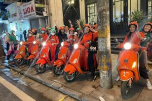 Vespa Female Ao Dai riders Night Street Food + See Train Street - Meeting at 6:00 pm: setting up for a safe, smooth ride
