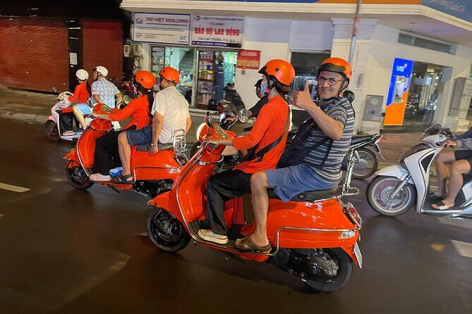 Vespa Female Ao Dai riders Night Street Food + See Train Street - Stop 4: Hồ Trúc Bạch and Ngu Xa street food—multiple pho styles and more