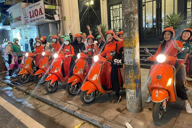 Vespa Female Ao Dai riders Night Street Food + See Train Street - Meeting at 6:00 pm: setting up for a safe, smooth ride