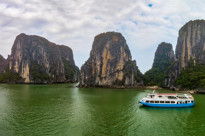 Ha Long Bay Six Hours Trip Kayaking & Swimming on Beach - Kayaking or bamboo boat in Luon Cave