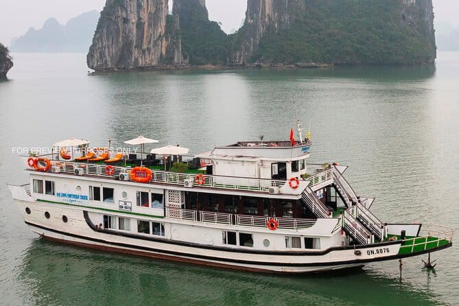 HALONG BAY LUXURY IRIS CRUISE DAY TRIP-BEST SELLER: Kayak, Music - Sunset on the sundeck: live singer, pianist, and DJ with canapés