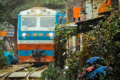 Hanoi Walking Street Food Tour with Train-Street Visit - Bun Cha and Spring Rolls: The First Stop Is About Skill, Not Guesswork
