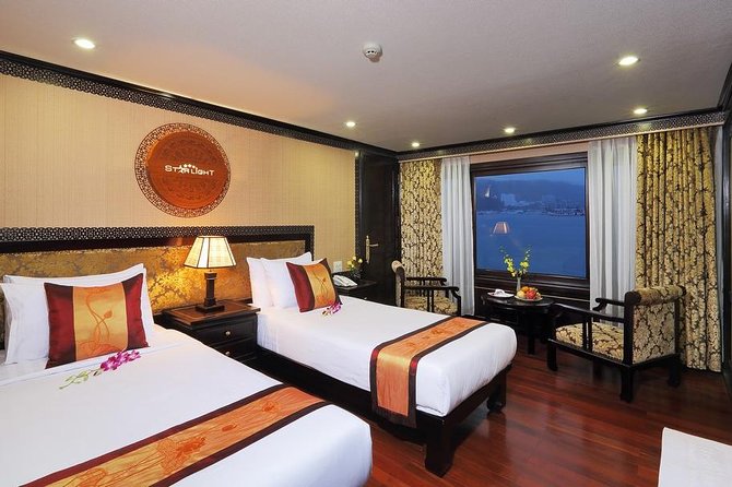 Overnight Halong Bay Cruise on the Starlight - Day 2: Tai-Chi at Dawn and Luon Cave by Sampan or Kayak